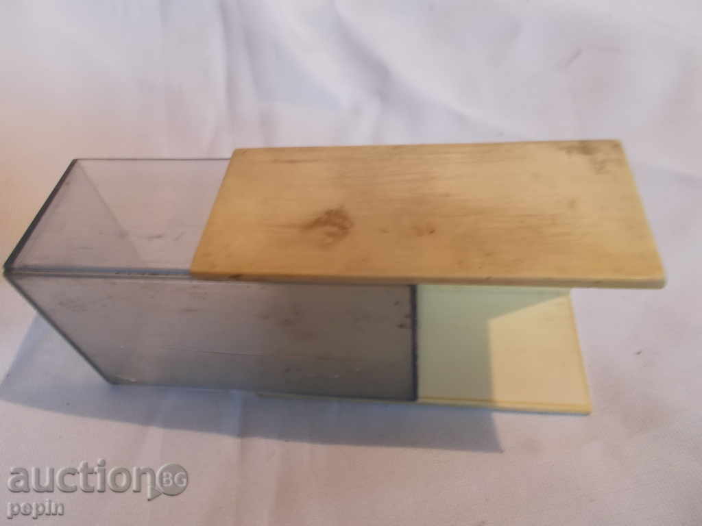 An old plastic box of knitting hooks with price 5.00 BGN | € 2.56