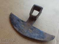 Old forged hoe, wrought iron tool
