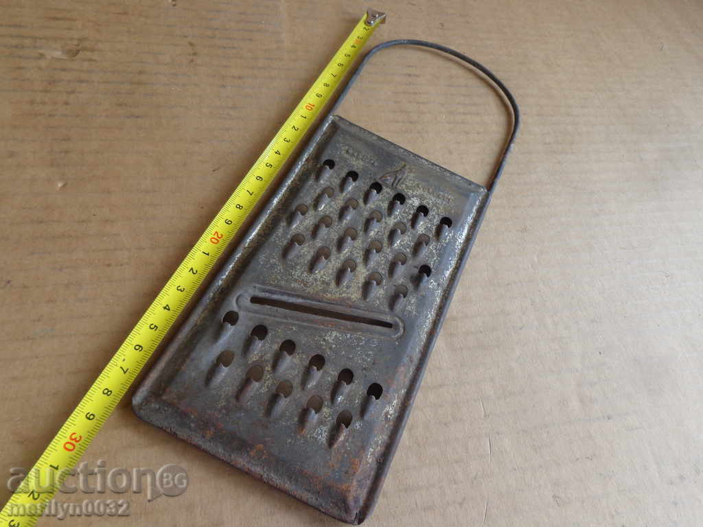 Auction Old grater from the beginning of the twentieth century Auction Old grater from the beginning of the twentieth century
