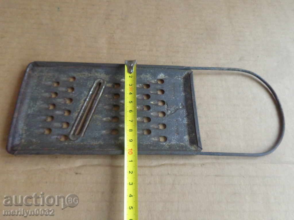 Delivery of Old grater from the beginning of the twentieth century Delivery of Old grater from the beginning of the twentieth century