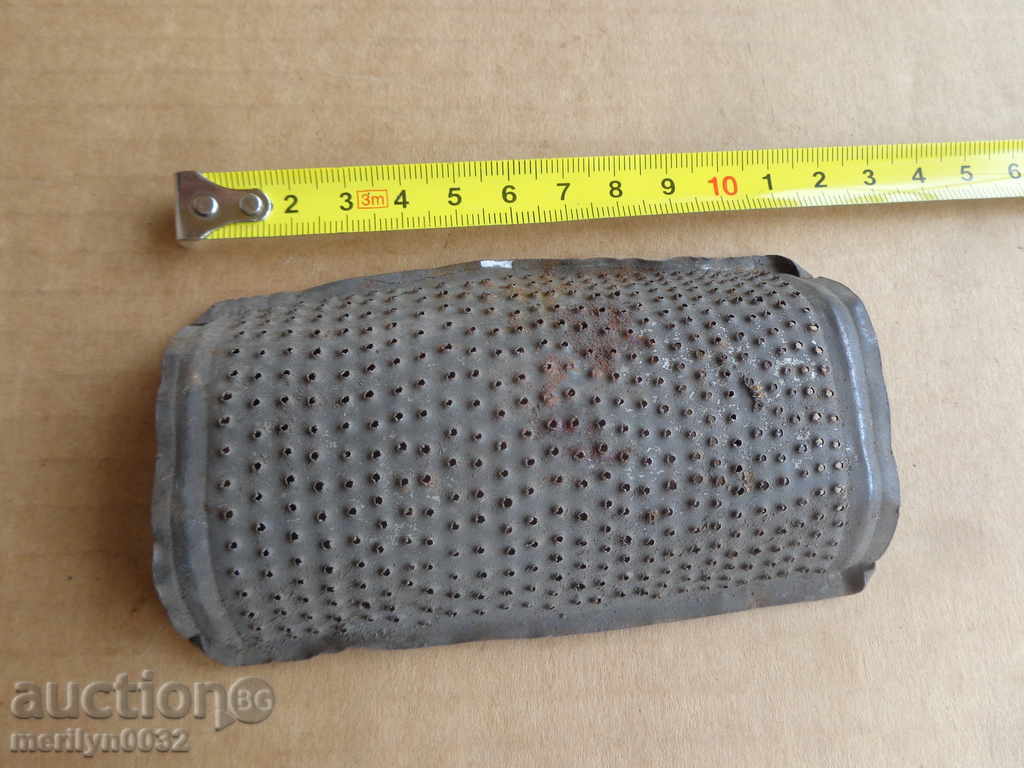 Delivery of Old grater from the beginning of the twentieth century Delivery of Old grater from the beginning of the twentieth century