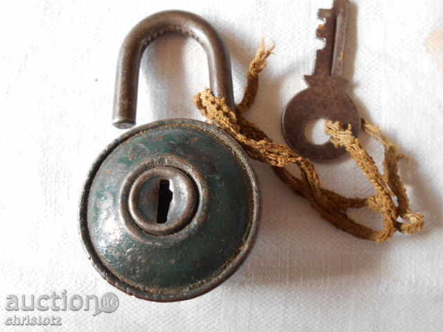Old padlock with key-working