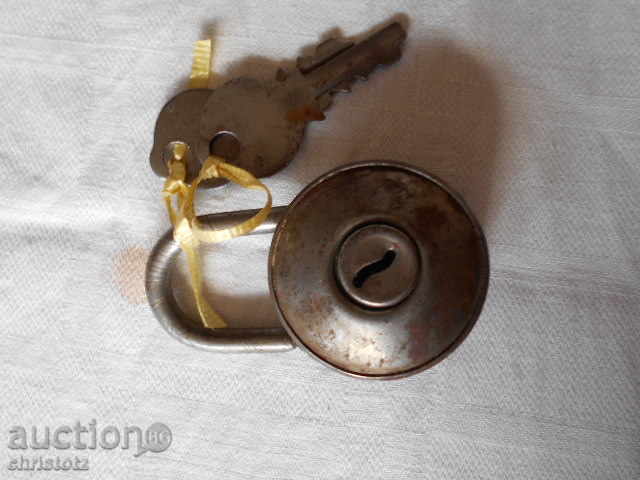 Old padlock with key-working