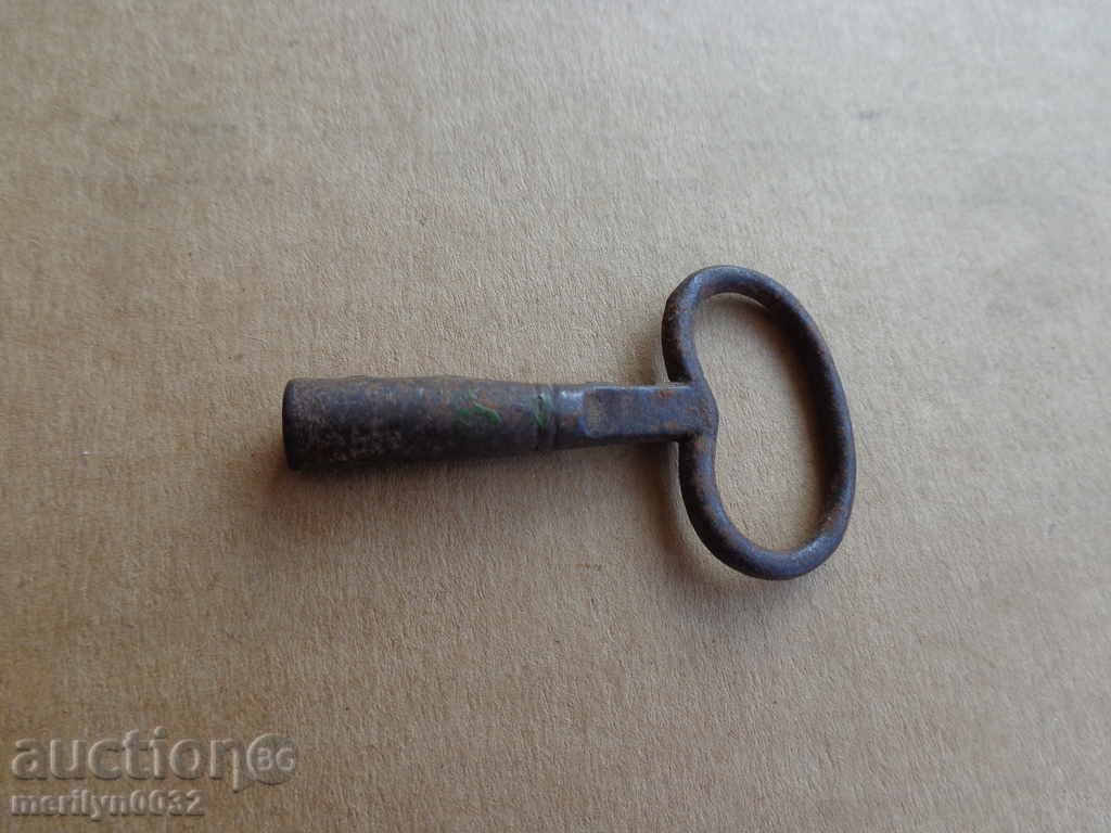 Auction An old clock key for Joker Auction An old clock key for Joker