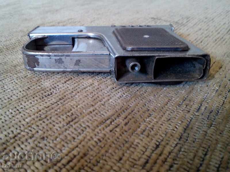 Auction  Old gun lighter
