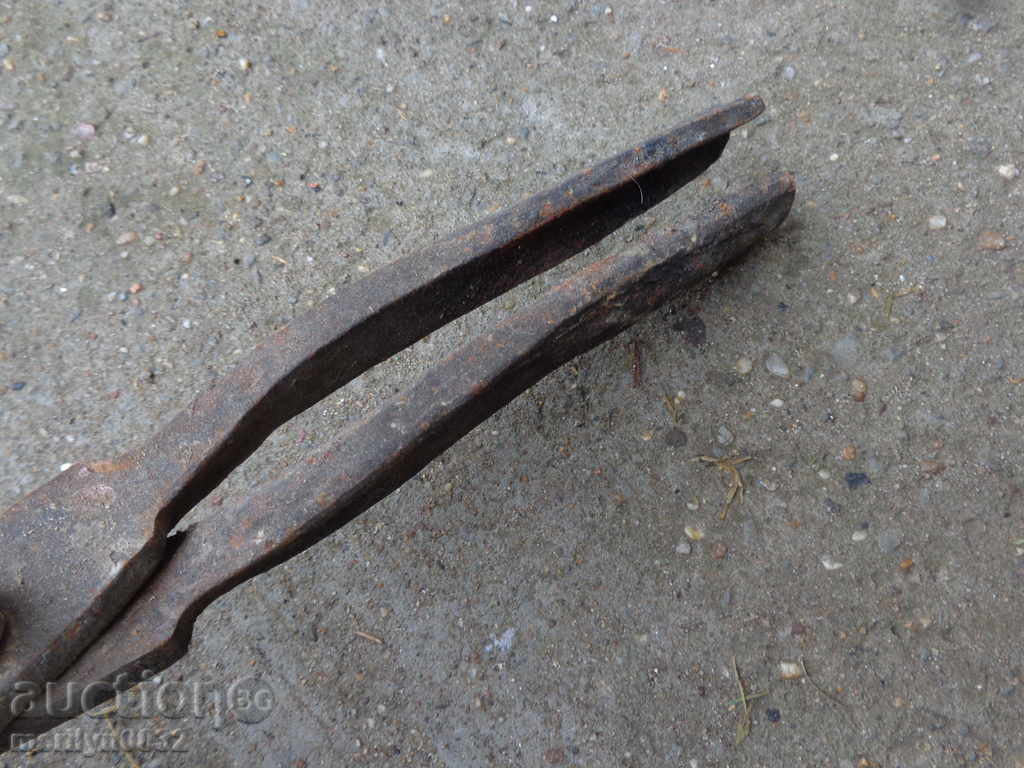 Delivery of Old forging pliers, wrought iron, tool Delivery of Old forging pliers, wrought iron, tool