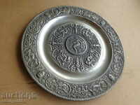 Metal dish bowl bas-relief wall-to-wall