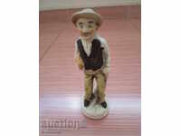 English porcelain statuette man
