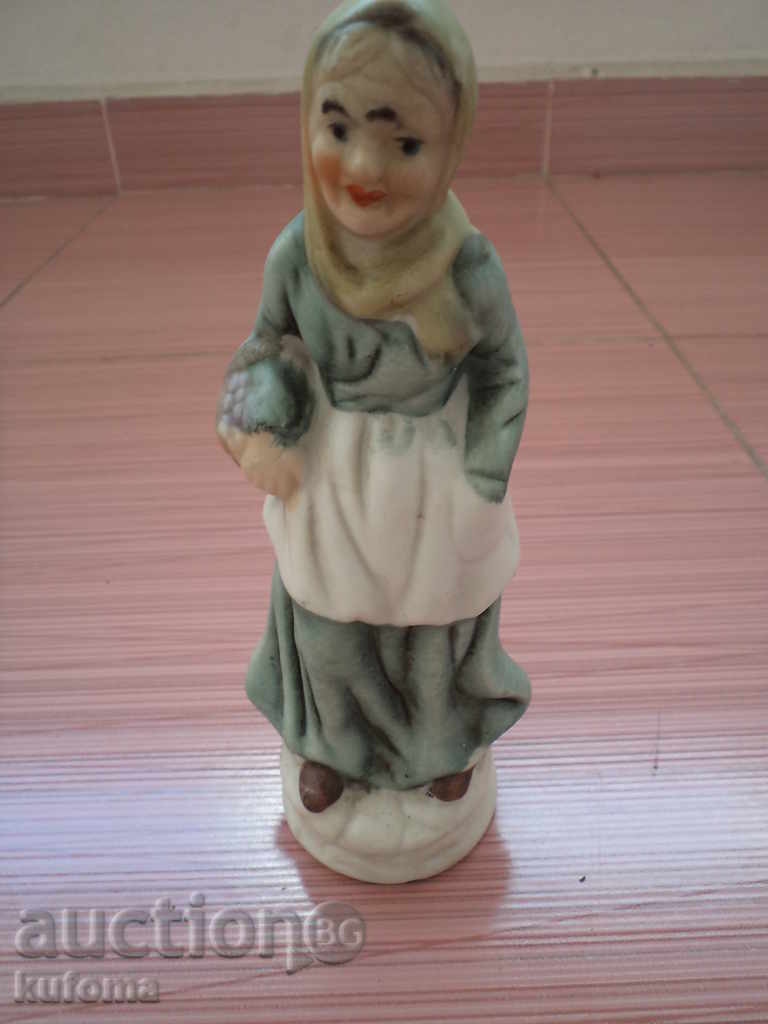 English porcelain statuette woman