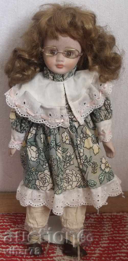 Porcelain doll with price 49.99 BGN | € 25.56