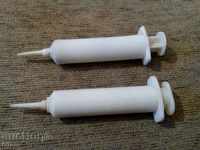 Old plastic syringes