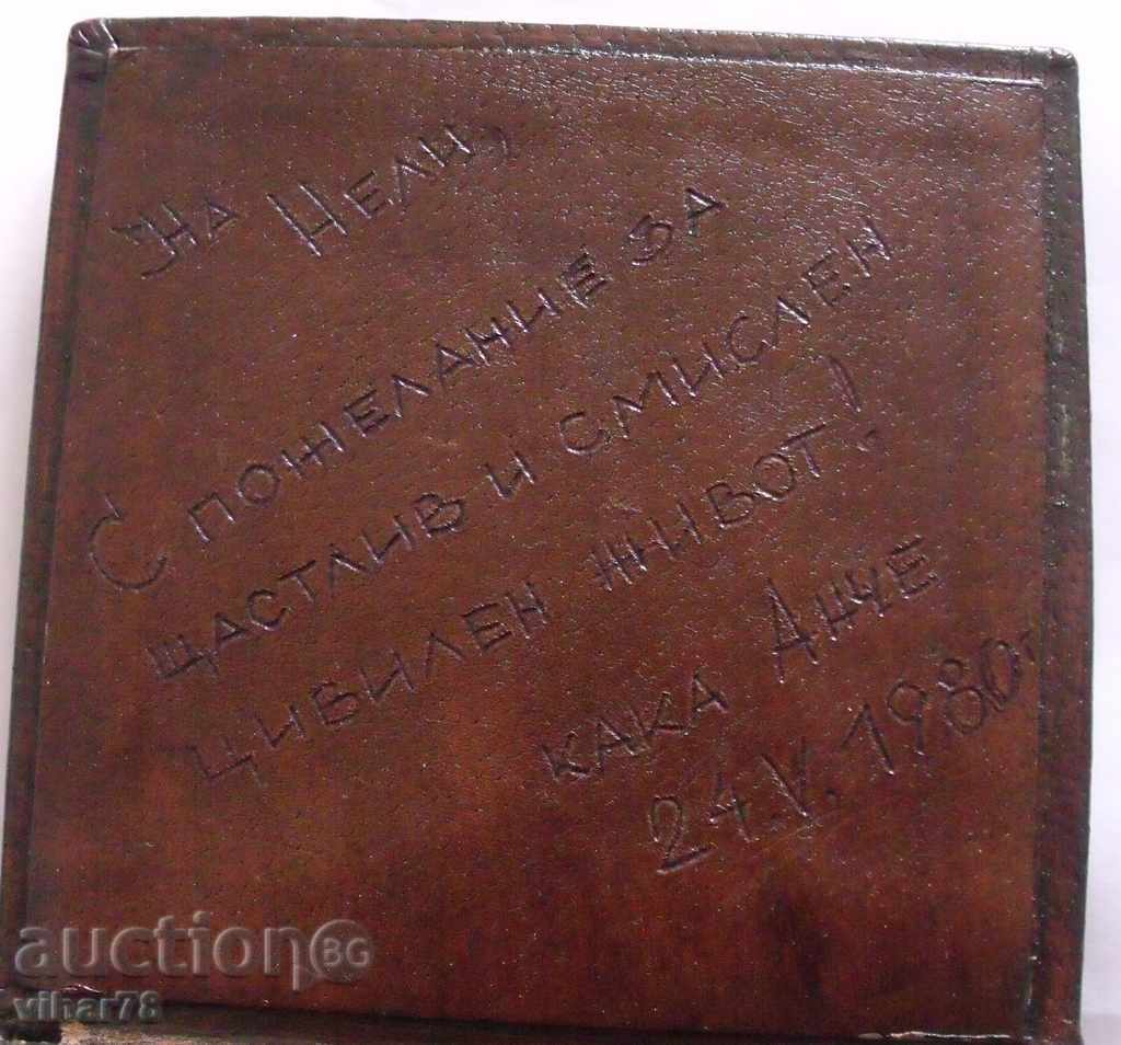 Auction  Old wooden box with leather