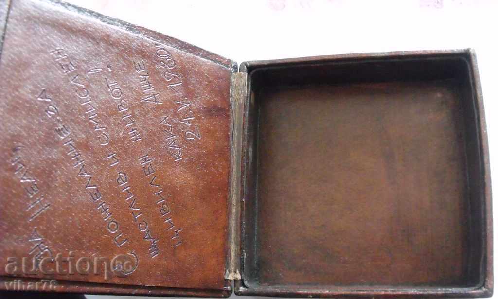 Delivery of Old wooden box with leather