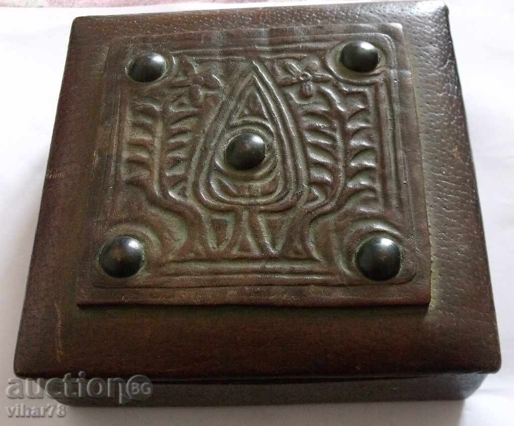 Old wooden box with leather