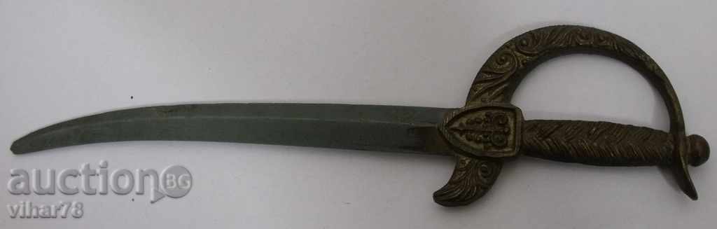 an old-fashioned blade for letters