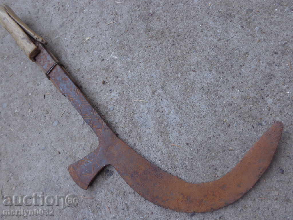 Auction  Old manual forged cutter with engravings, wrought iron toothbrush blade
