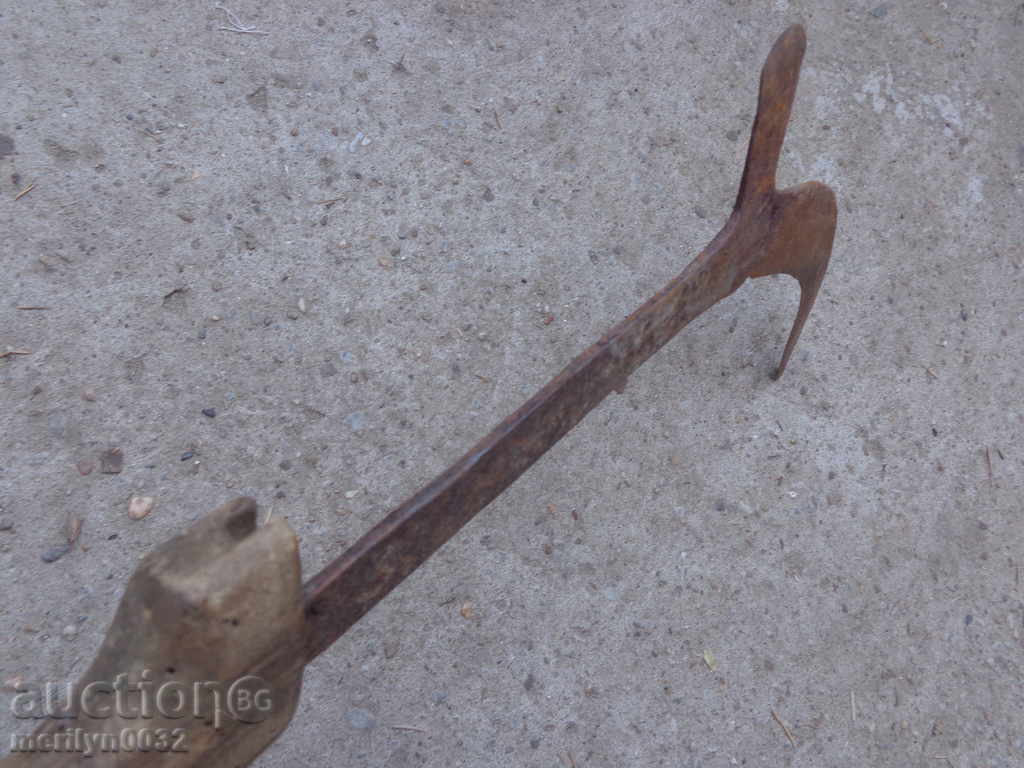 Delivery of Old manual forged cutter with engravings, wrought iron toothbrush blade Delivery of Old manual forged cutter with engravings, wrought iron toothbrush blade