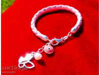 Silver pink bracelet with an eye.