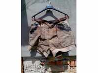 Παλιά κοντά δερμάτινα παντελόνια