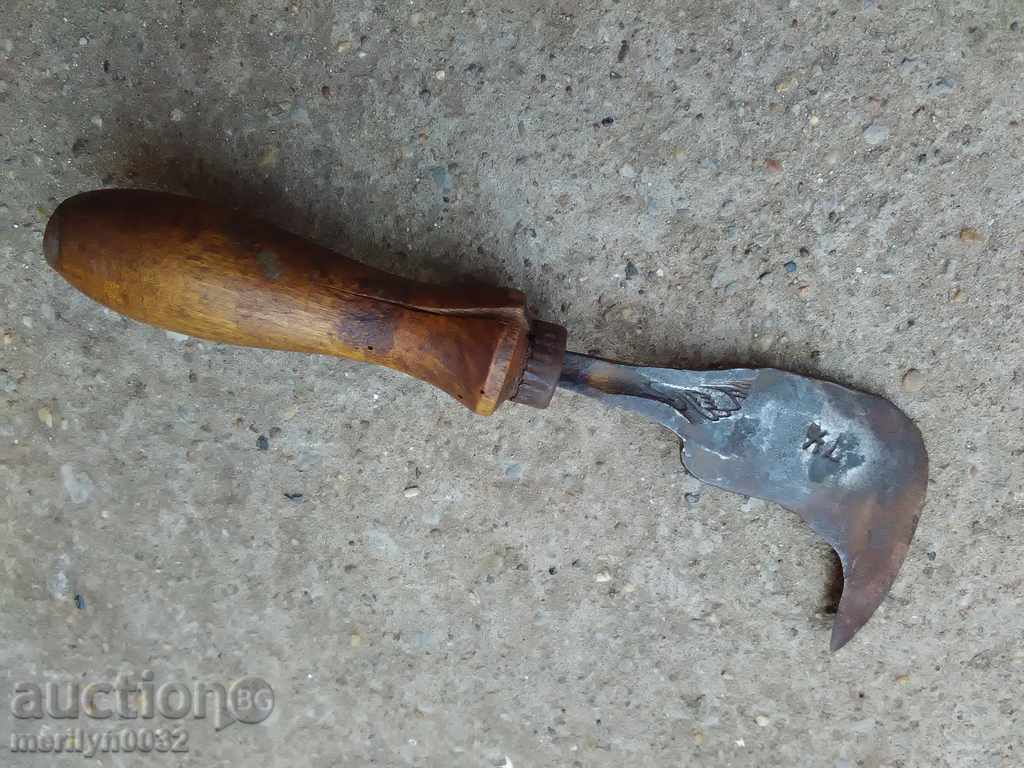 Old hand forged hammer, wrought iron blade