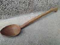 Very old wooden spoon, ladle, wooden