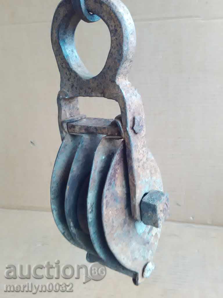 Old forged roller polisher wrought iron pulley reel