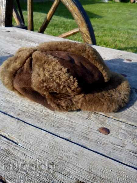 An old leather hat with price 5.00 BGN | € 2.56