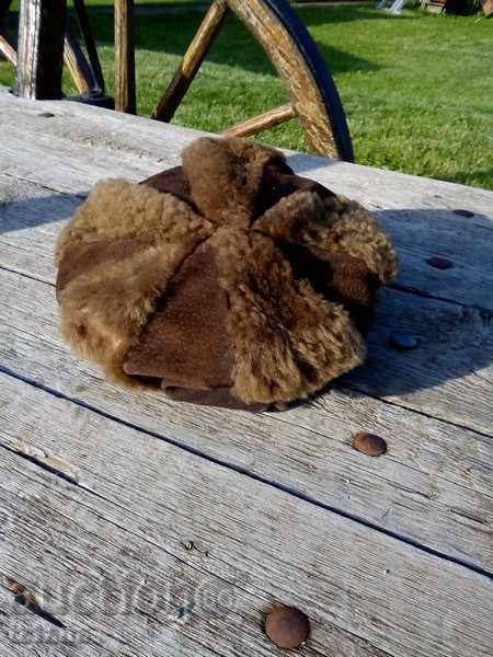 Auction  An old leather hat