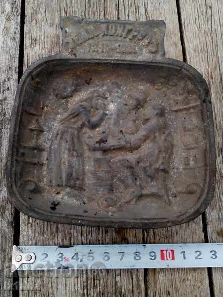 Ancient ashtray, a plate, a souvenir