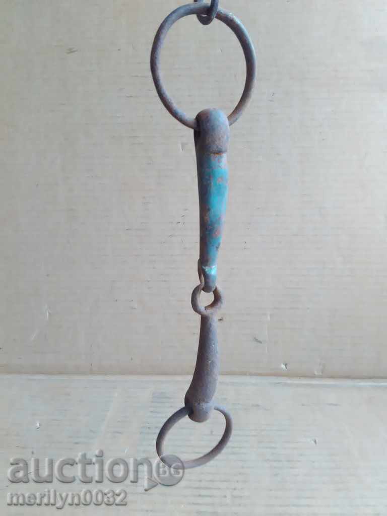Delivery of Old forged reins, a bent iron brace, a harness