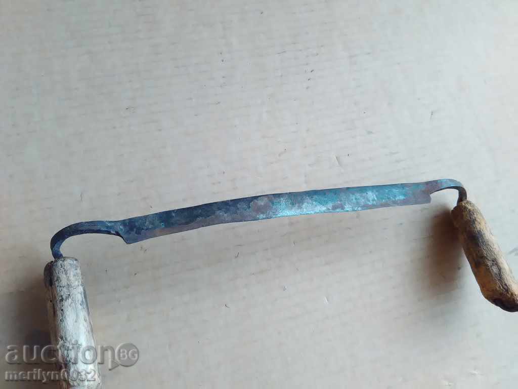 Delivery of Old rusty wrought iron tool Delivery of Old rusty wrought iron tool