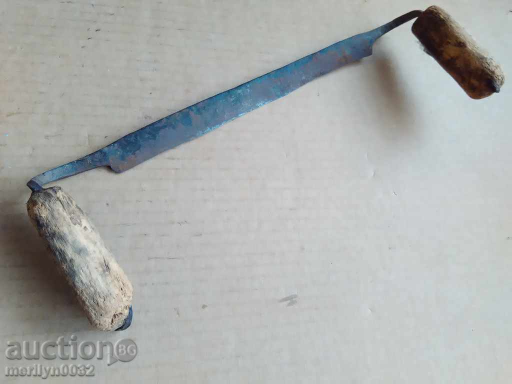 Old rusty wrought iron tool Old rusty wrought iron tool