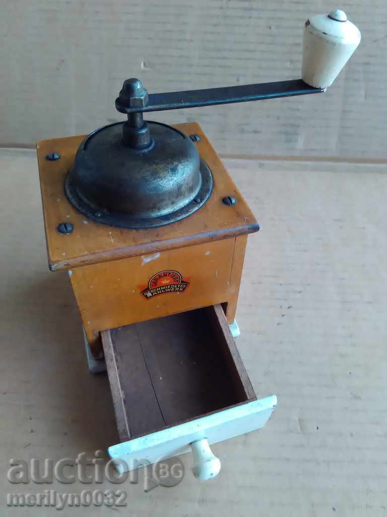 Delivery of An old German coffee pepper mills Delivery of An old German coffee pepper mills