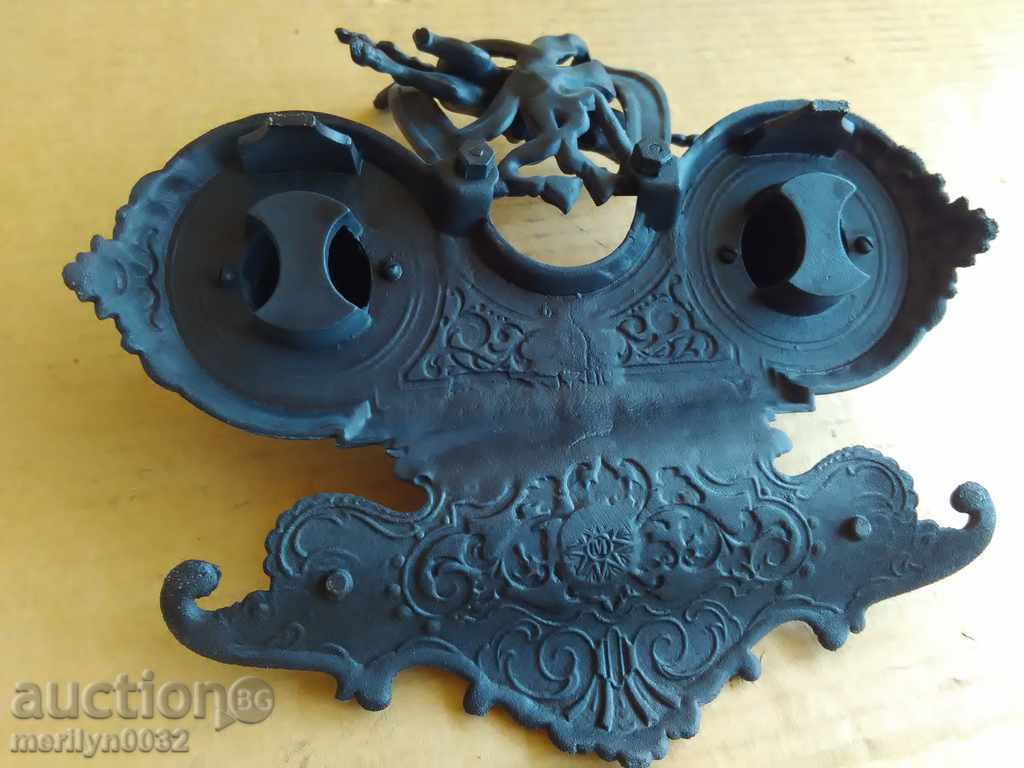 Auction  An old ink cartridge with a figure, a statuette, a figurine