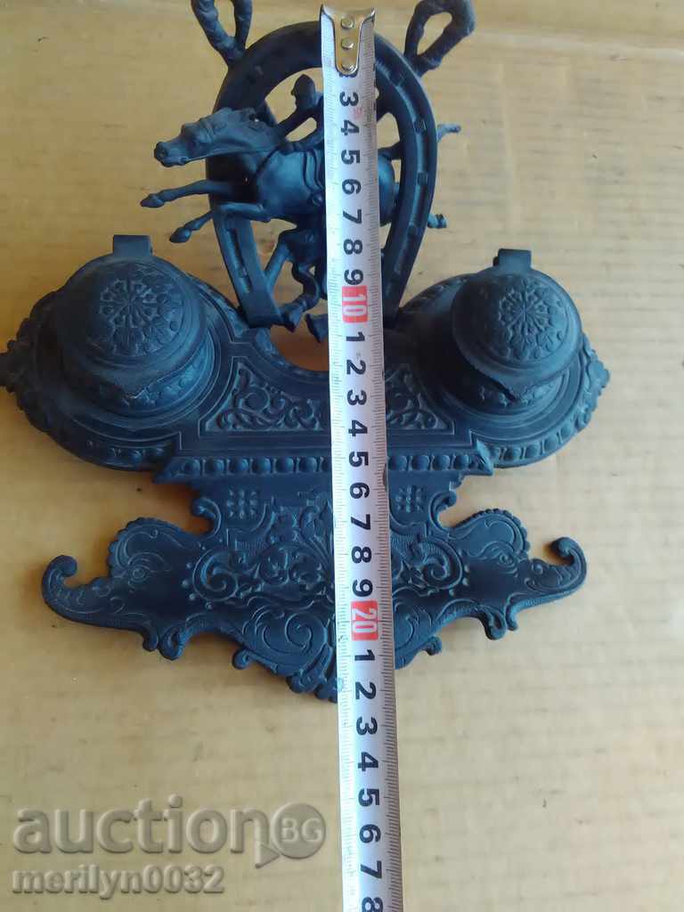 An old ink cartridge with a figure, a statuette, a figurine - 7