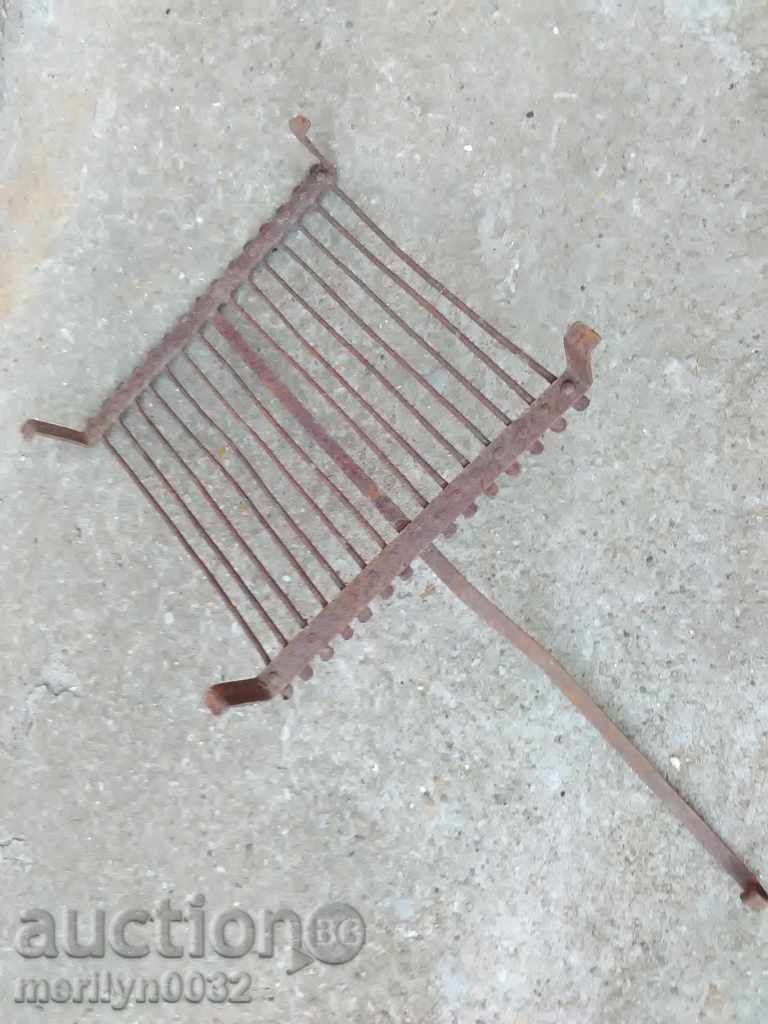 Auction An old hand-forged grill, a steak, wrought iron Auction An old hand-forged grill, a steak, wrought iron
