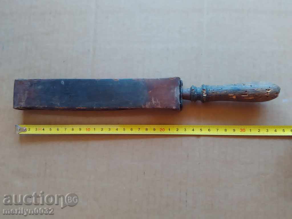 Auction  An old barber belt, a strap, a razor, a slicker