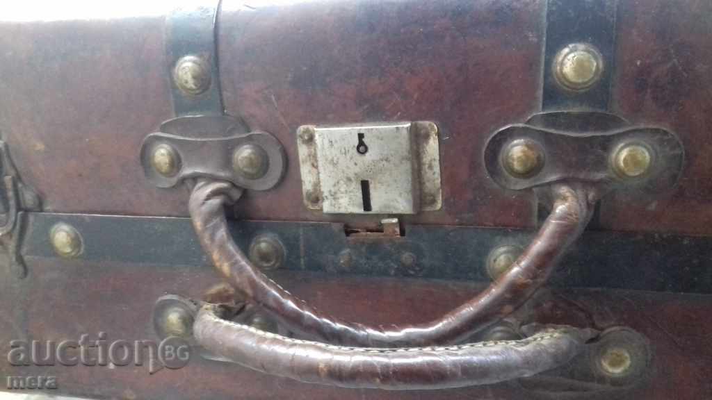 Delivery of An old passenger suitcase from a dial Delivery of An old passenger suitcase from a dial