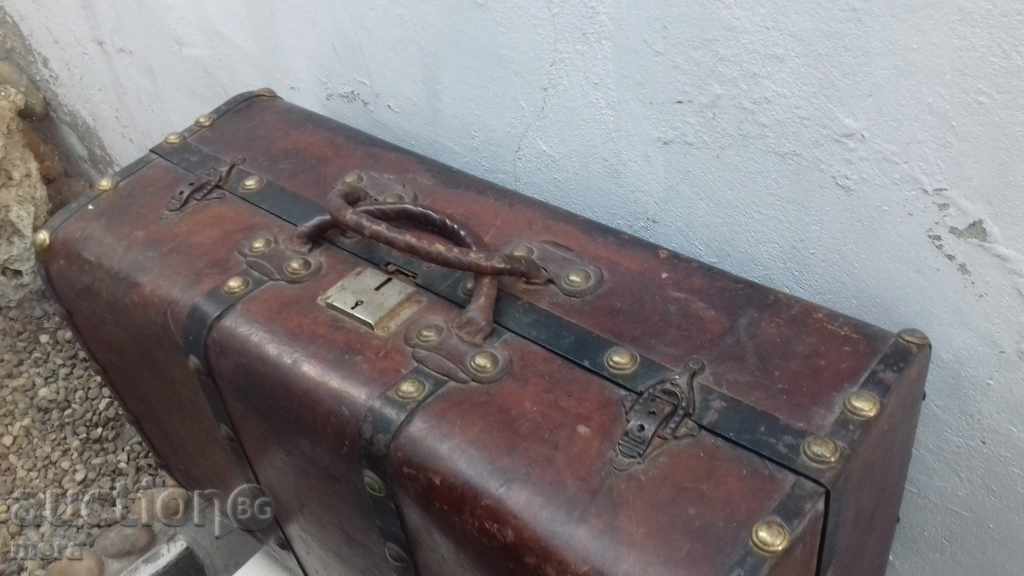 An old passenger suitcase from a dial - 7 An old passenger suitcase from a dial - 7