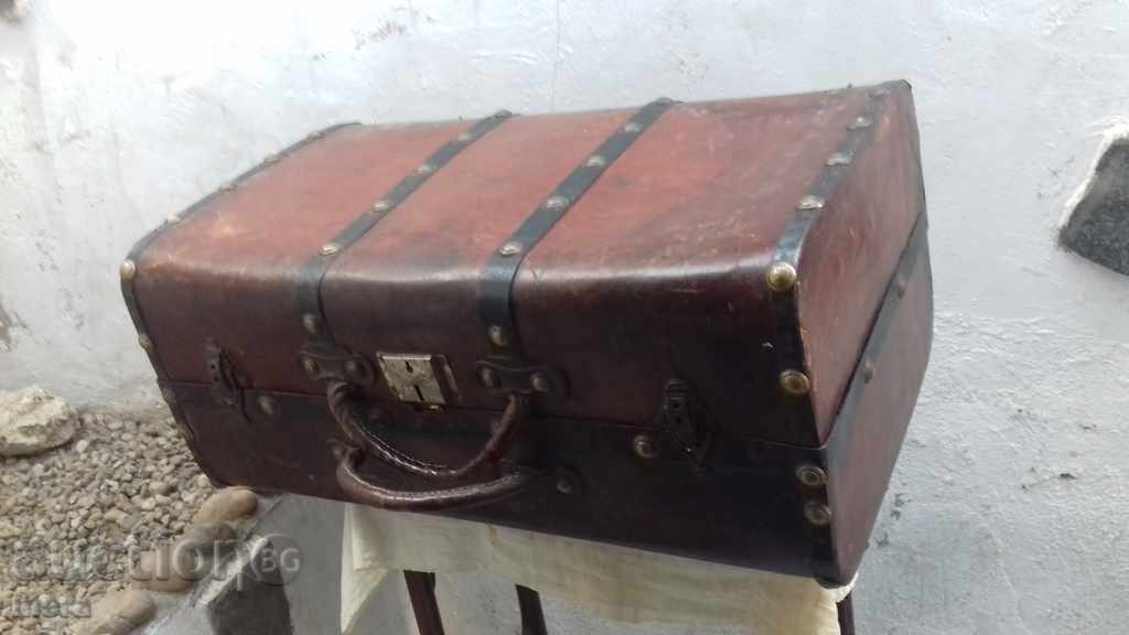 An old passenger suitcase from a dial
