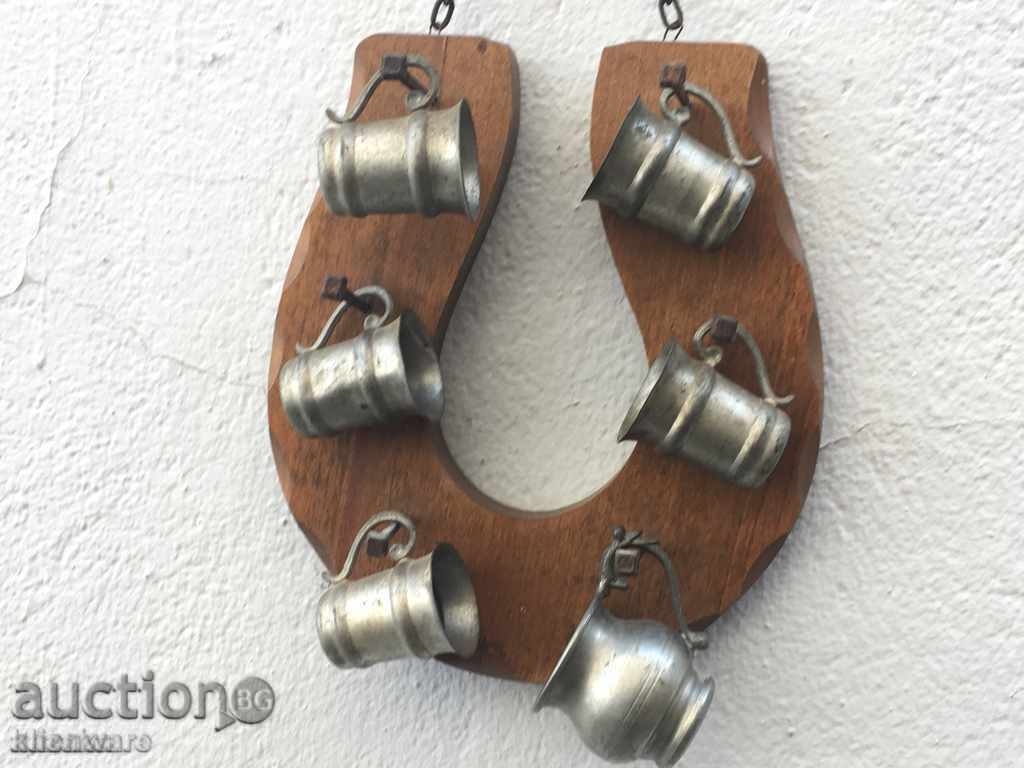 Delivery of Zinc cups on an interior stand Delivery of Zinc cups on an interior stand