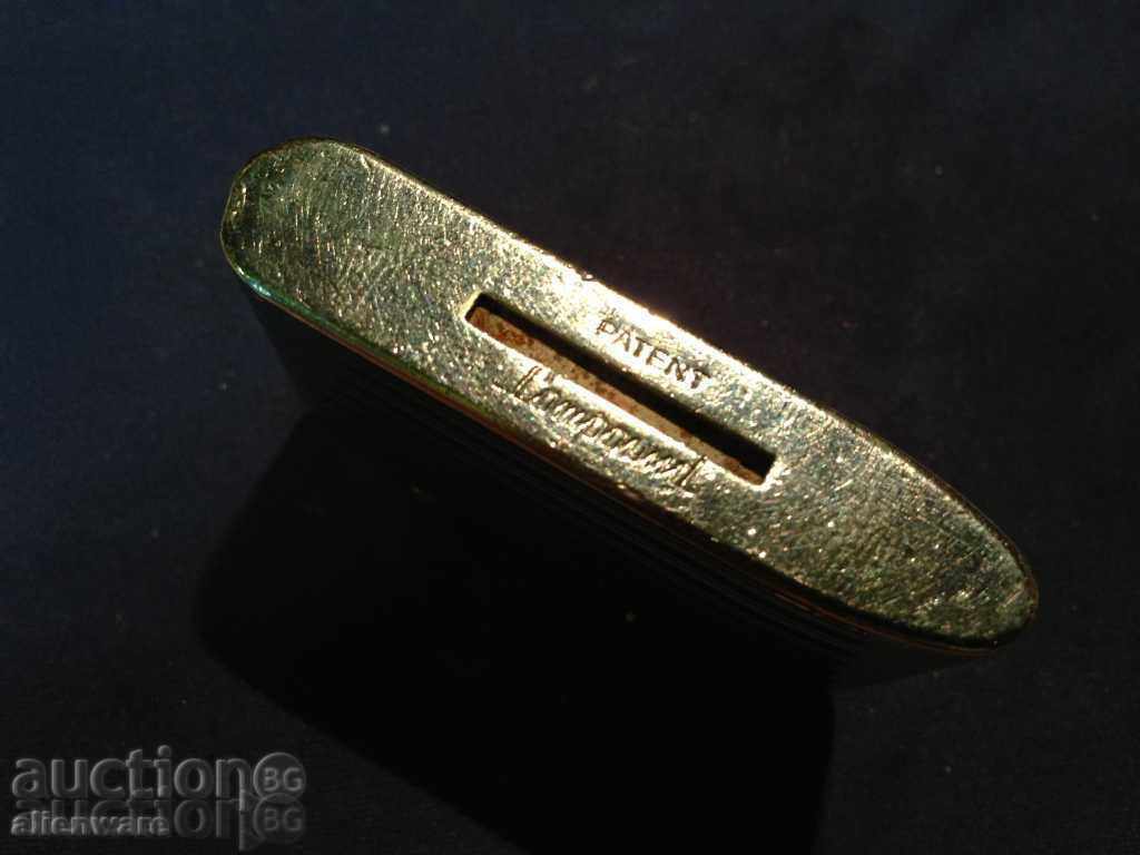 Auction  An old lighter