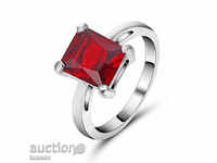 Ring with ruby, white rhodium plated