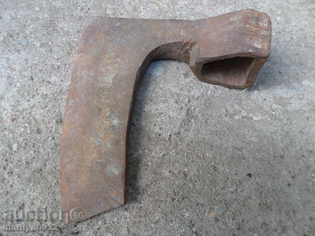 An old ax ax, a top, a satin