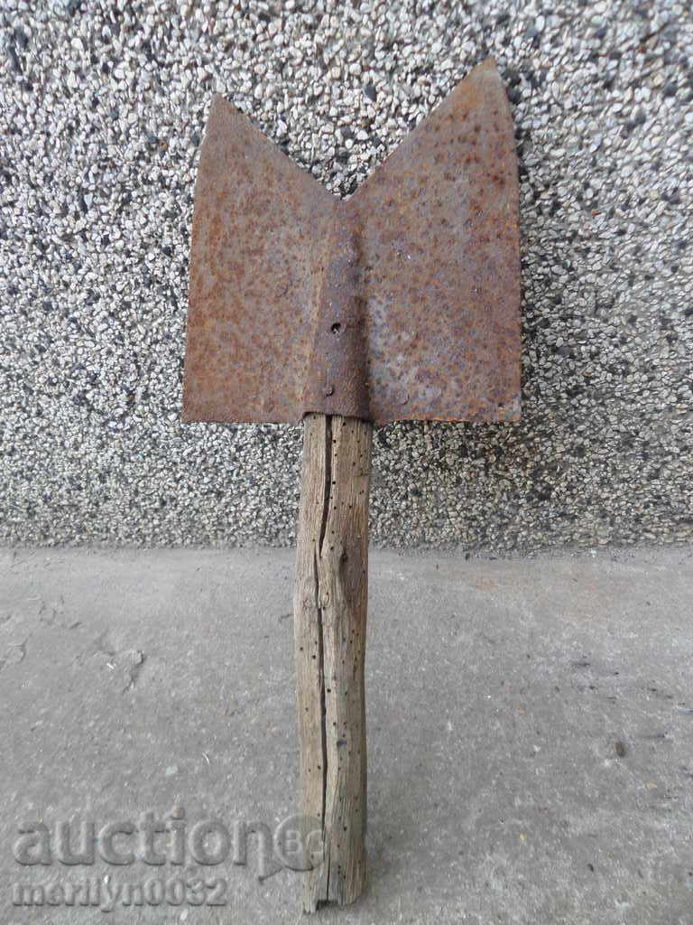 Delivery of An old straight shovel with a gouged iron tool Delivery of An old straight shovel with a gouged iron tool