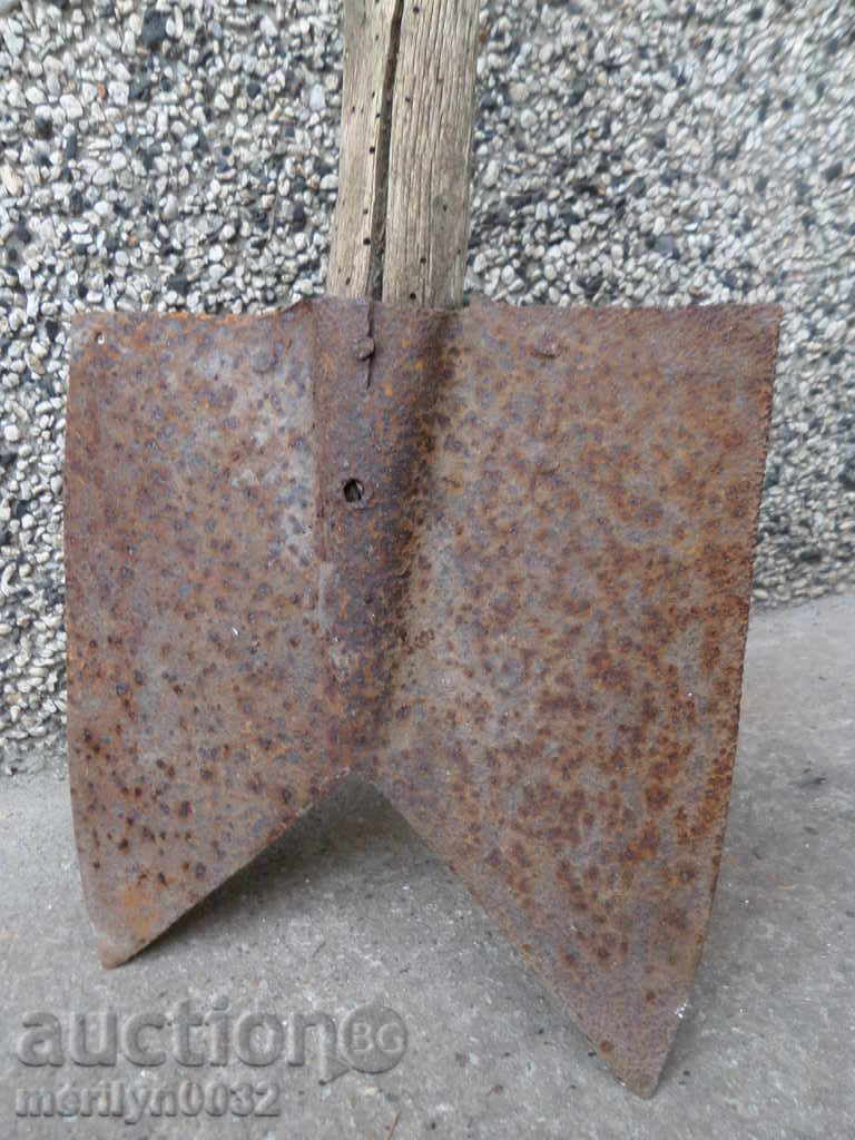 An old straight shovel with a gouged iron tool - 5 An old straight shovel with a gouged iron tool - 5