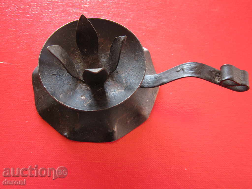 Delivery of Old ashtray made of wrought iron candle lamp