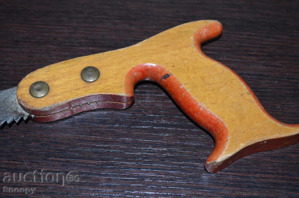 Old steel saw with a wooden handle with price 18.00 BGN | € 9.20 Old steel saw with a wooden handle with price 18.00 BGN | € 9.20