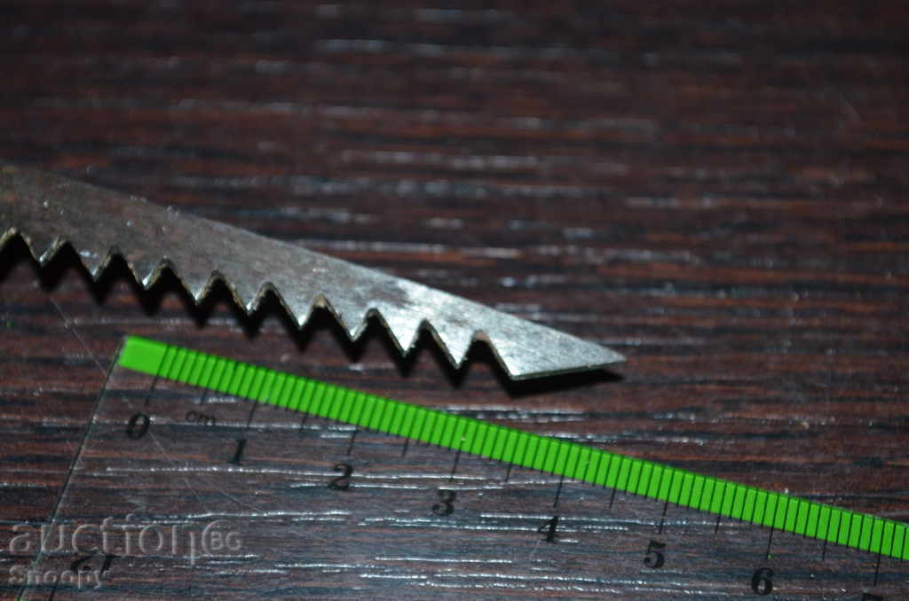 Old steel saw with a wooden handle - 5 Old steel saw with a wooden handle - 5