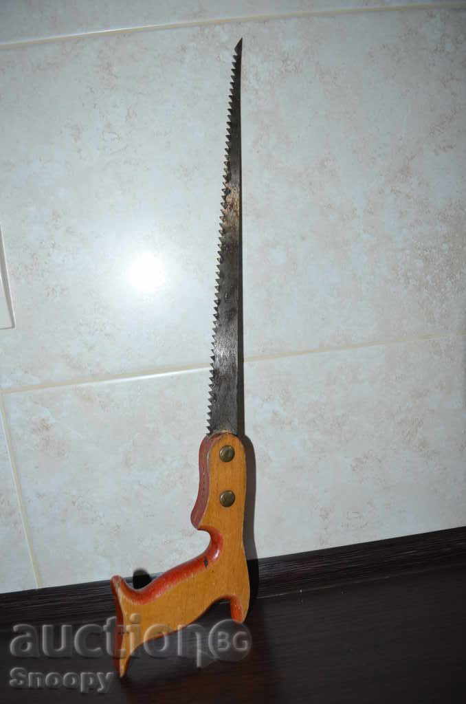 Old steel saw with a wooden handle - 6 Old steel saw with a wooden handle - 6